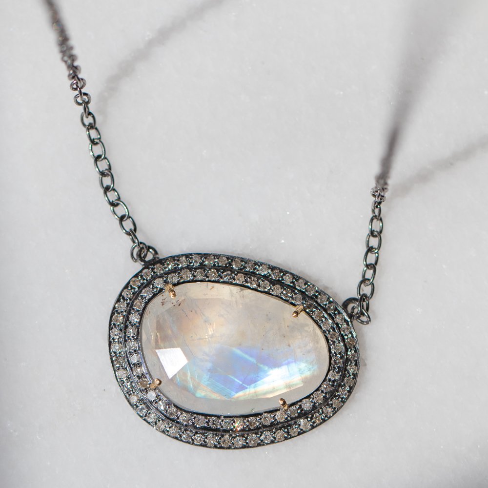 Rainbow moonstone necklace with white diamond bezel in sterling silver by Robindira Unsworth