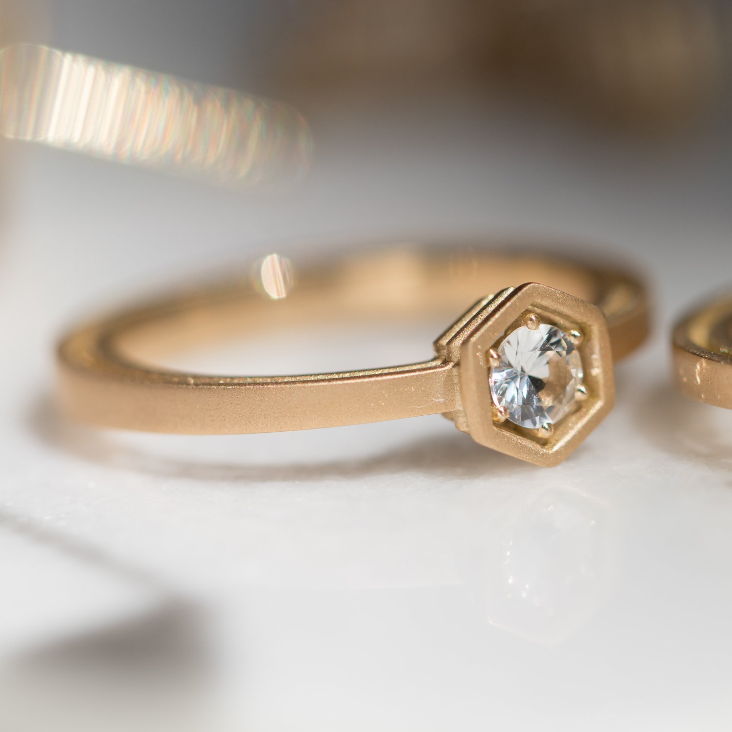 Three Story Single Hex Ring in 18k yellow gold and white sapphire by jewelry designer Roule & Co at NEWTWIST