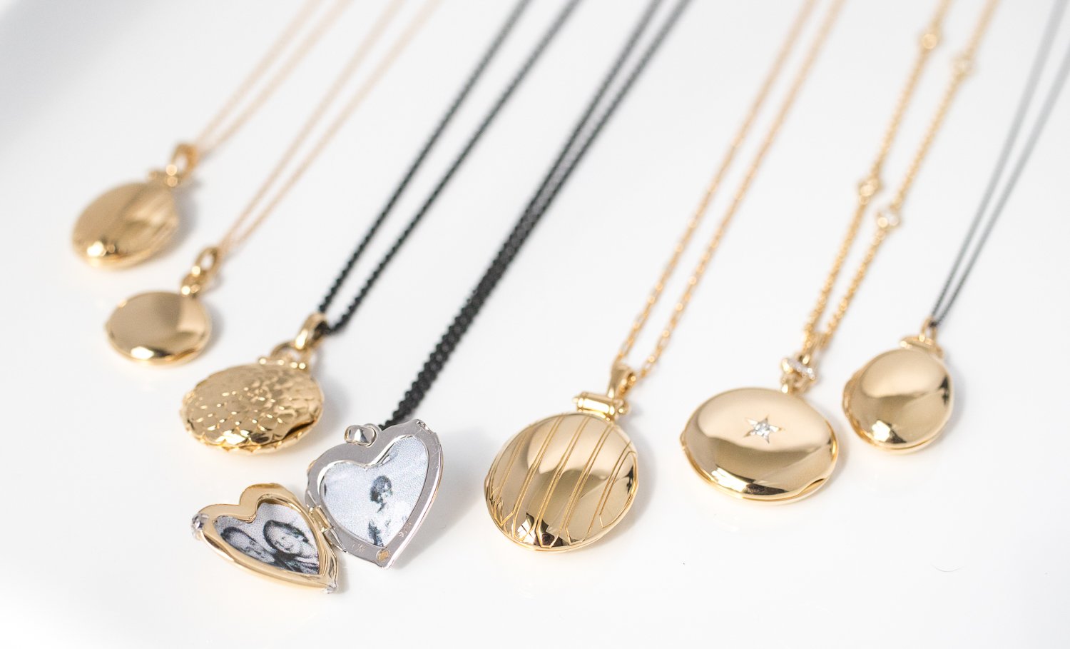 Gold lockets by jewelry designer Monica Rich Kosann