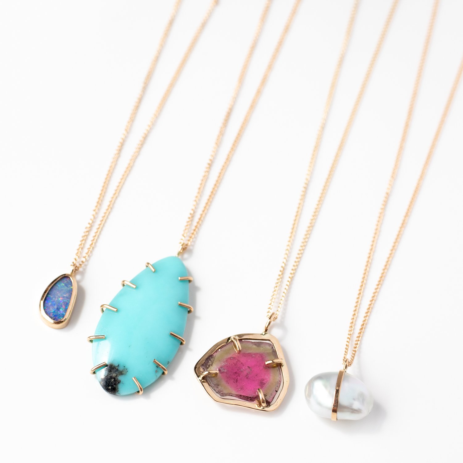 Semi-precious and precious stone necklaces set in 14k yellow gold by jewelry designer Melissa Joy Manning