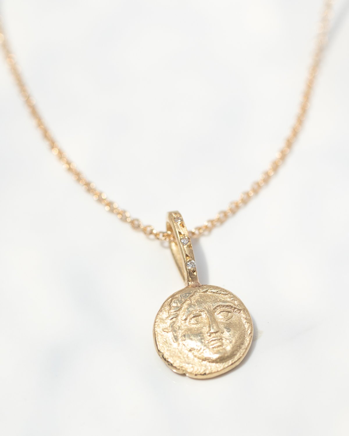 Be Brave artifact necklaced in 14k yellow gold by jewelry designer Robin Haley