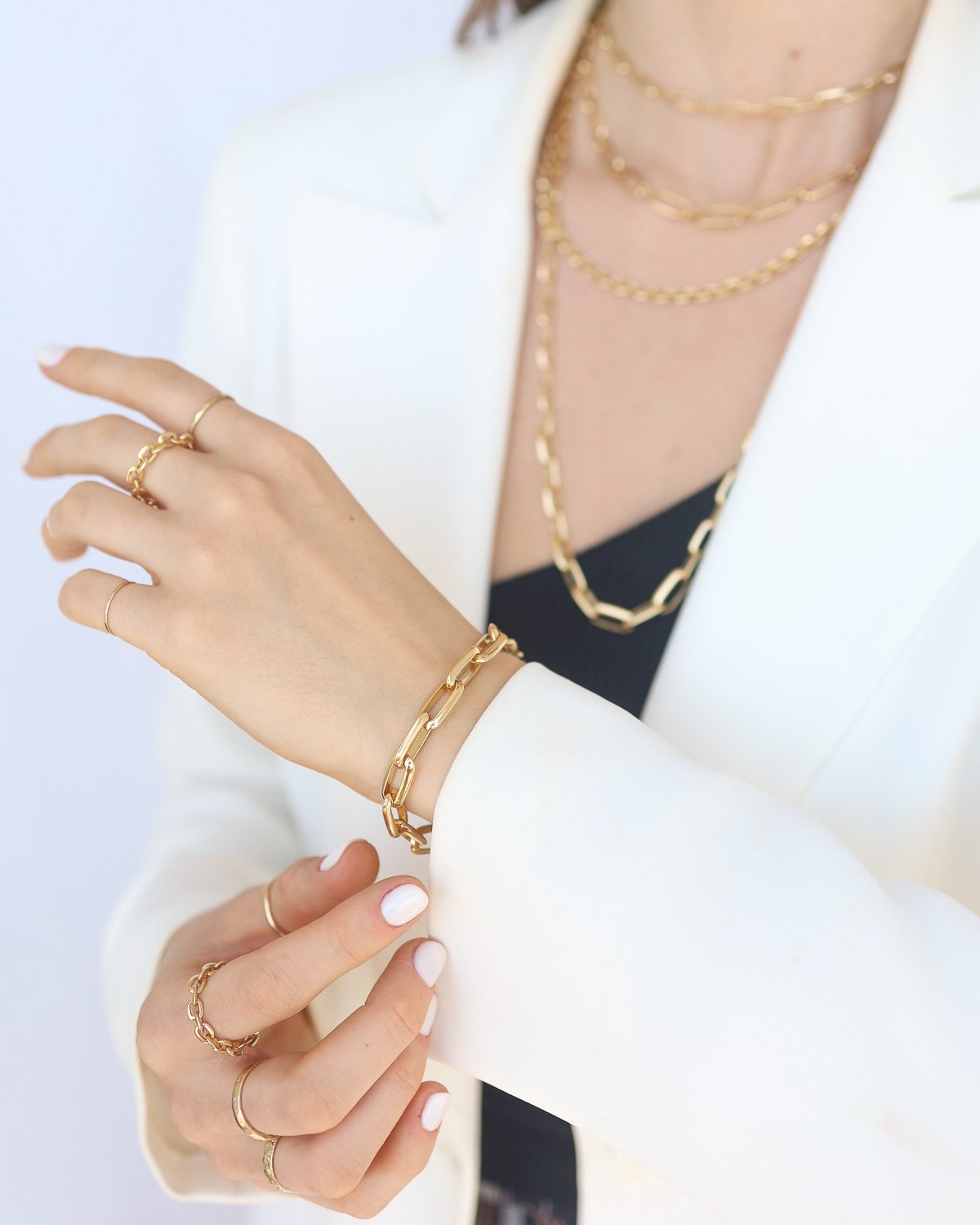 18k yellow gold chain necklaces and bracelets by jewelry designer Lizzie Mandler