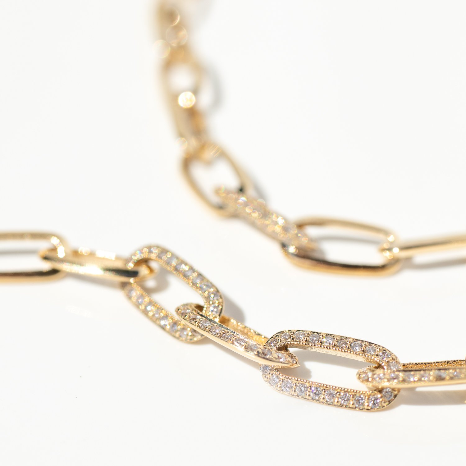 18k yellow gold chain necklaces and bracelets by jewelry designer Lizzie Mandler