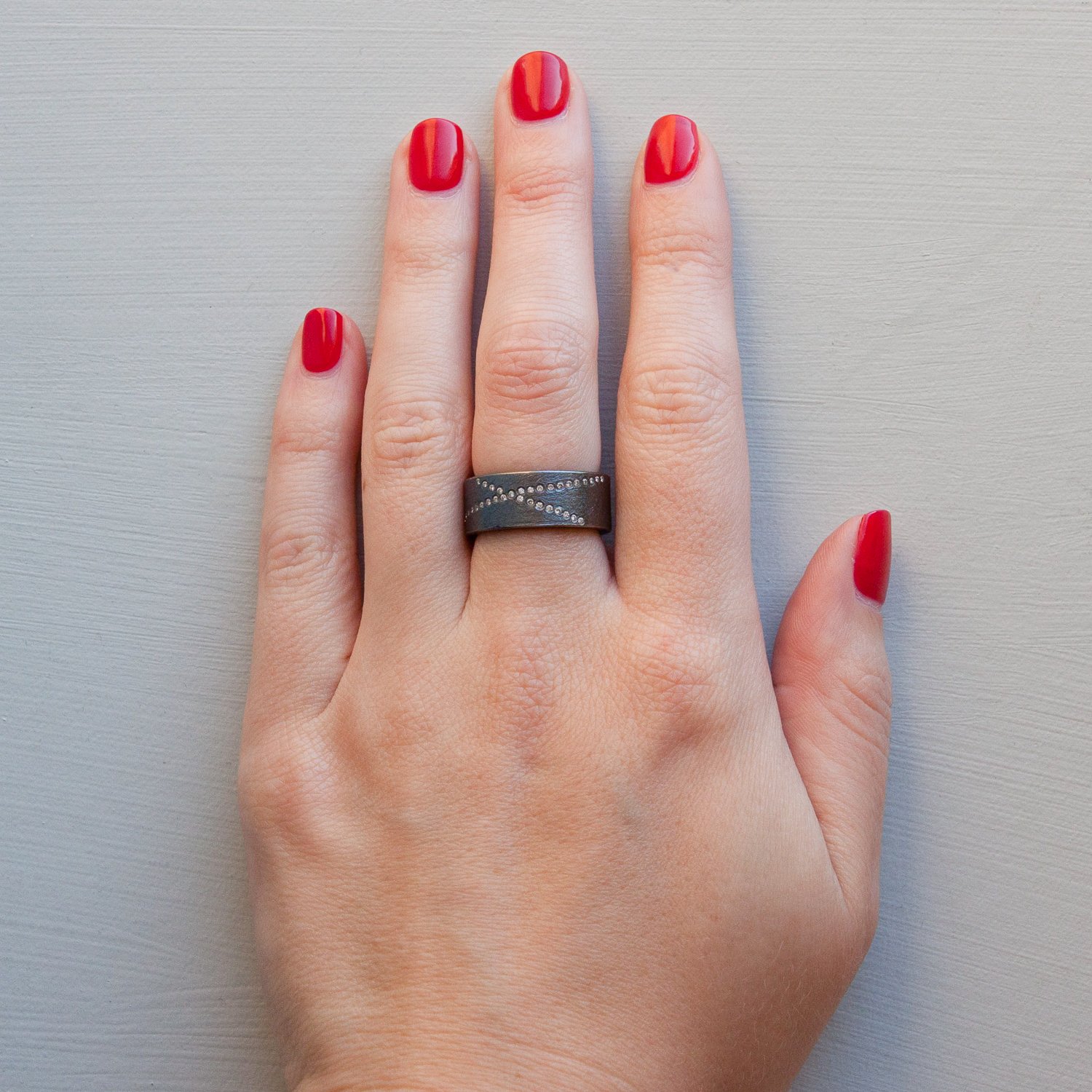 Todd Reed: Sterling silver, with white brilliant cut diamonds (.20ctw) ring