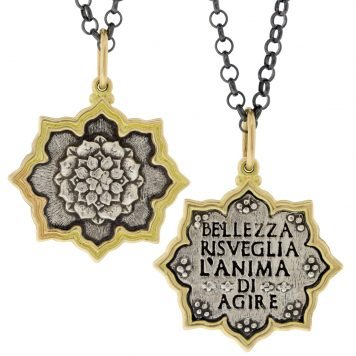 gold and silver charm by jewelry designer erica molinari