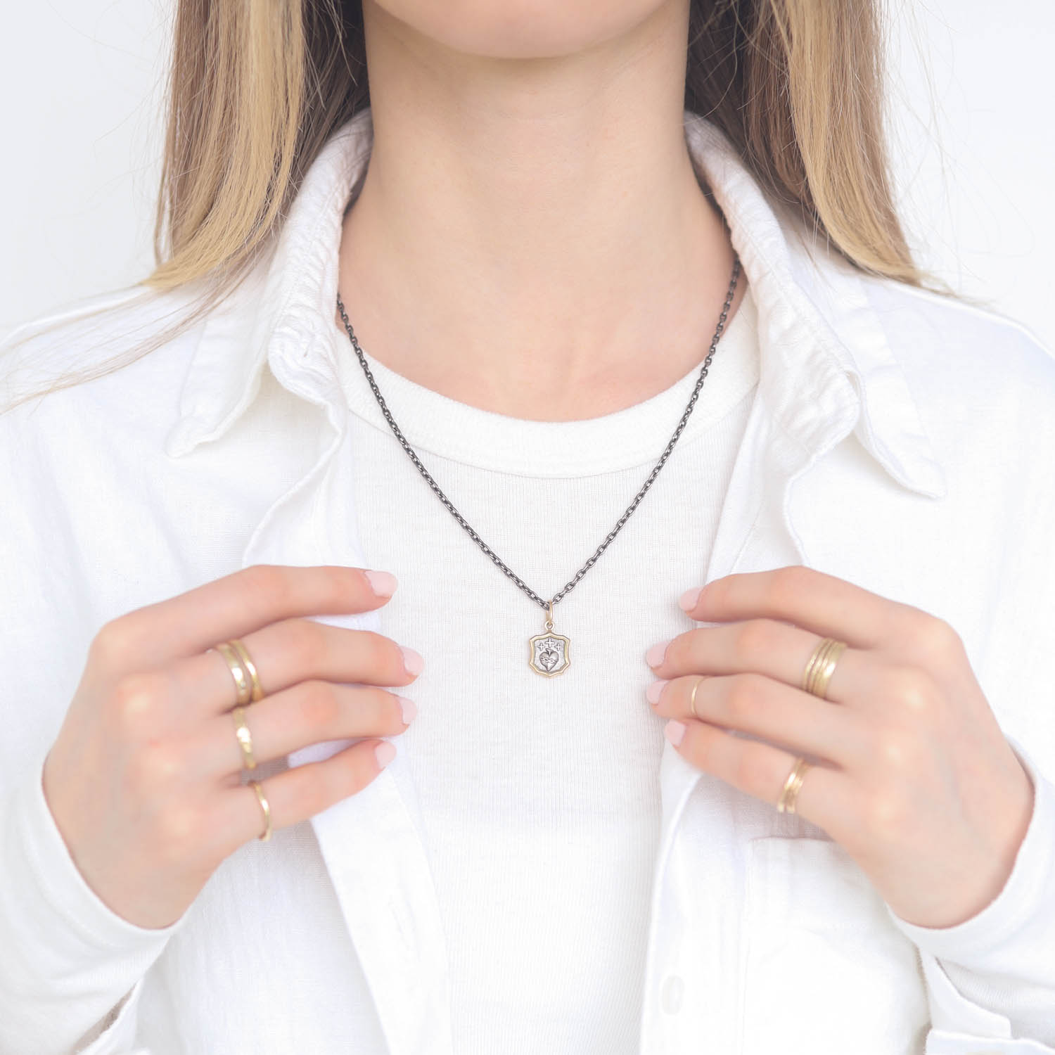 Erica Molinari Trunk Show: SS and 18K baby shield charm with sacred heart and cross
