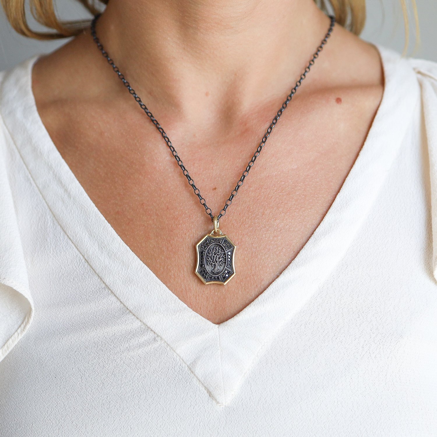 Erica Molinari Trunk Show: SS and 18K black diamond shield with family tree .60 TCW