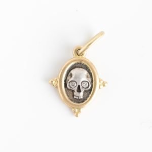 Erica Molinari Trunk Show: ss and 18k diamond eyes baby skull and flower .026cts