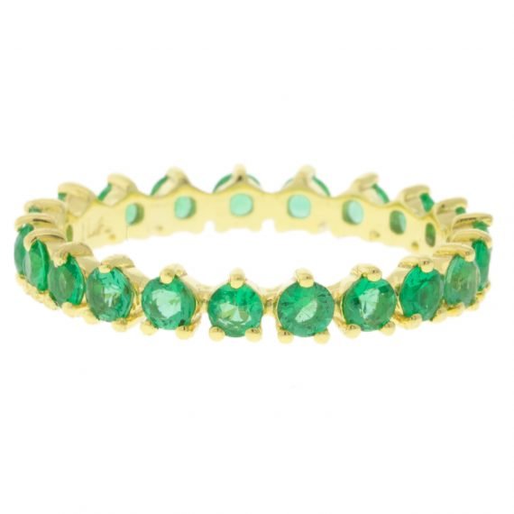 gold ring with emeralds by jewelry designer ila