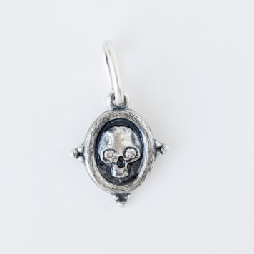 Erica Molinari Trunk Show: ss baby skull & flowers single diamond on flower - .026cts