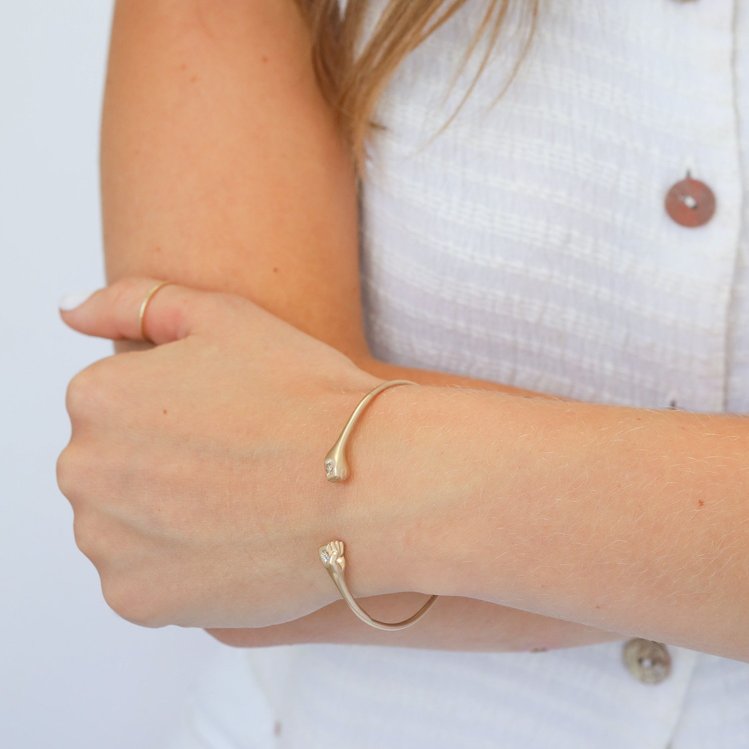 Victoria Cunningham: Bracelet, Fist, Diamond, 14K yellow gold