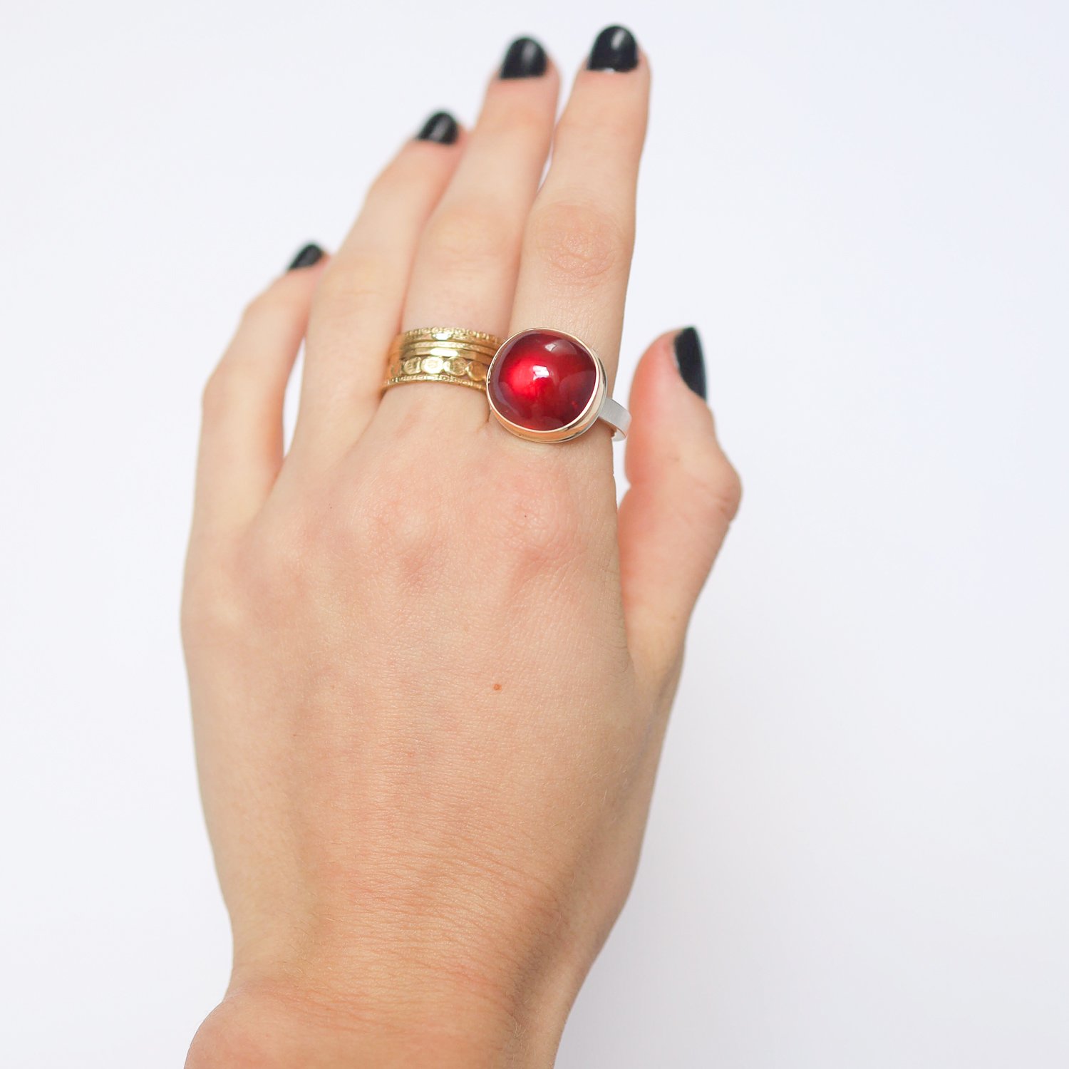 Jamie Joseph: Ring, Oval smooth, 14K yellow gold bezel set African ruby, Sterling silver X band, Stone measures 9/16 x 5/8, Currently available in size 7 1/4