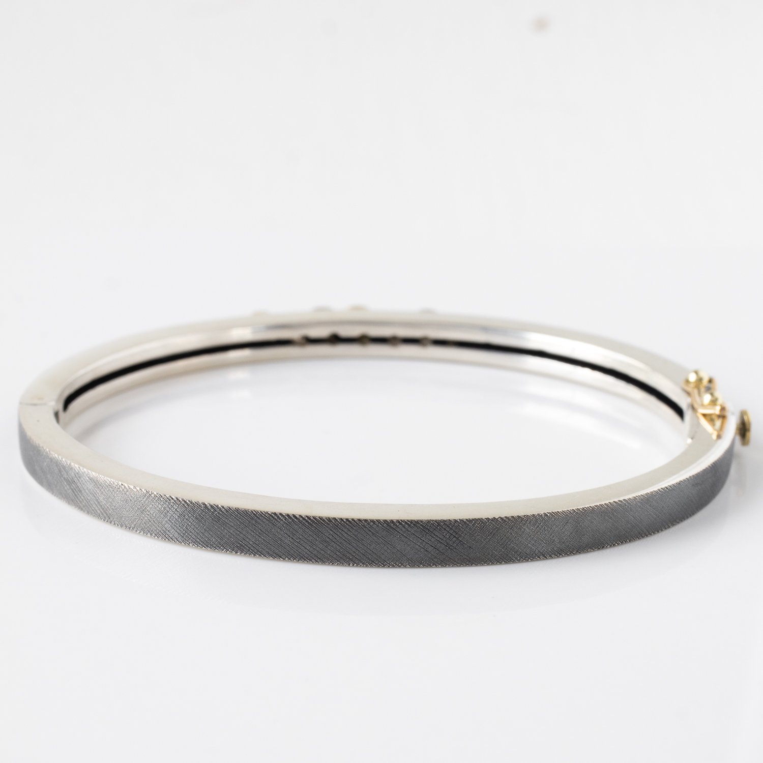 Rene Escobar :Bangle,SOPHIA,silver,18K Yellow gold bezel,0.25ct diamond,4 MM