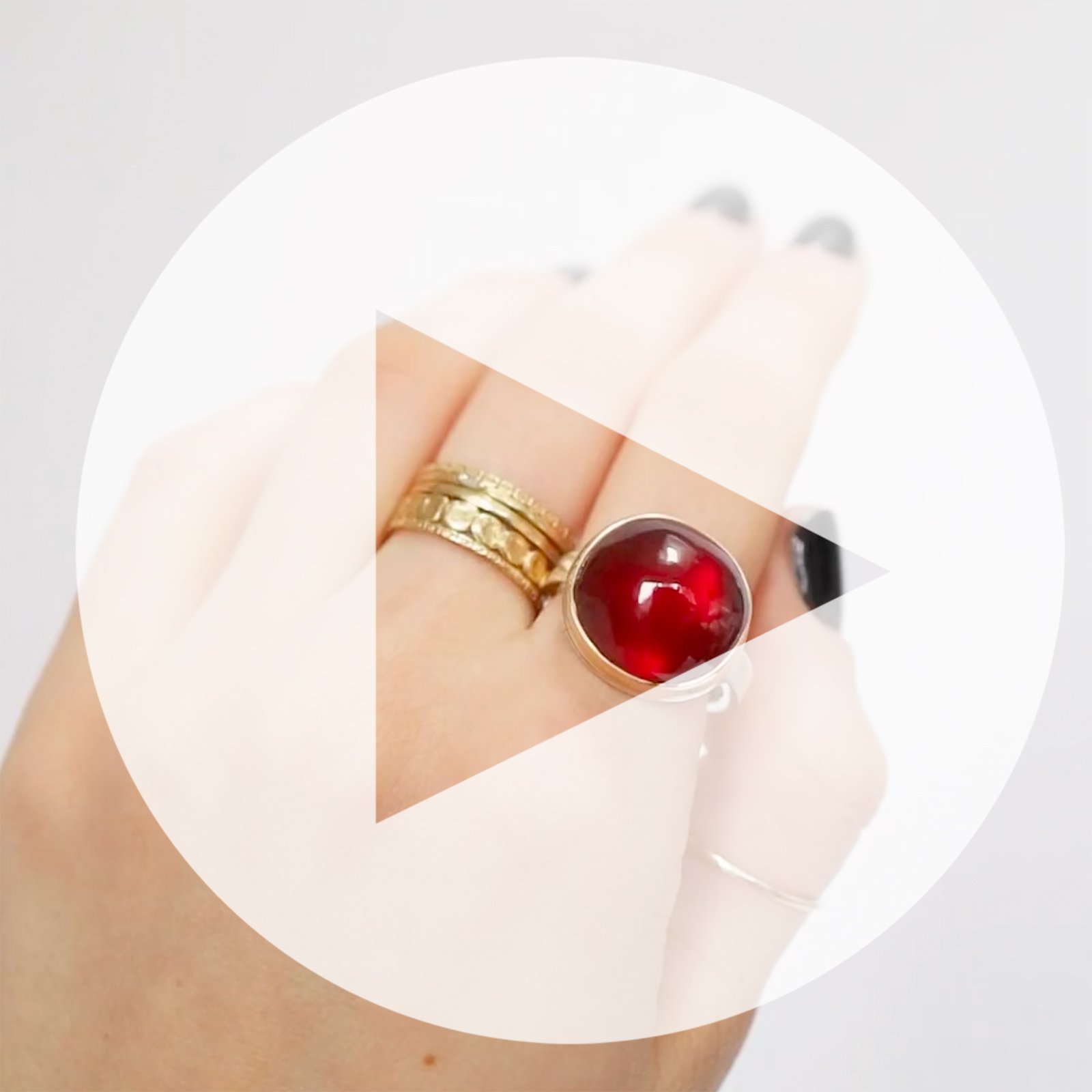 Jamie Joseph: Ring, Oval smooth, 14K yellow gold bezel set African ruby, Sterling silver X band, Stone measures 9/16 x 5/8, Currently available in size 7 1/4