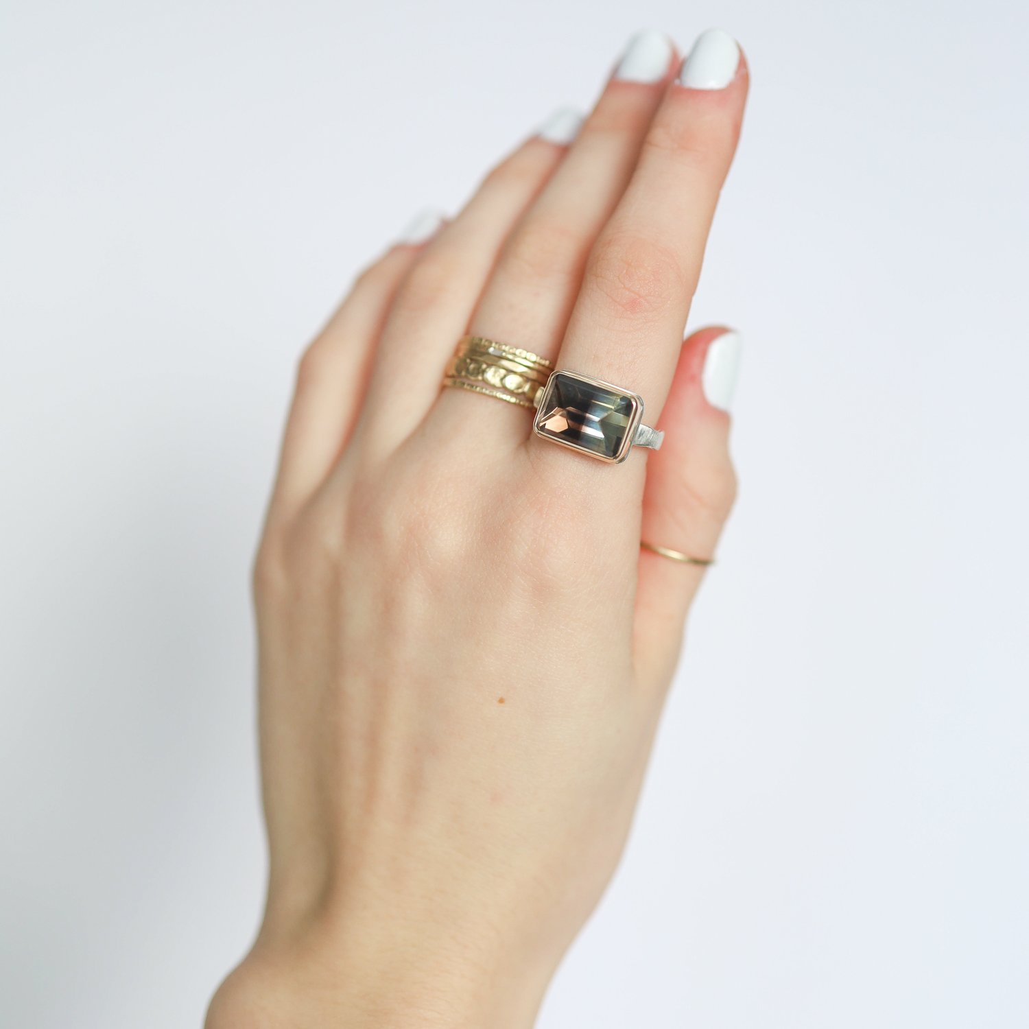 Jamie Joseph: Ring, Small rectangular inverted, 14K gold bezel set bi-color quartz, Sterling silver eroded live edge band, Stone measures 3/8 x 1/2, Currently available in size 6 3/4