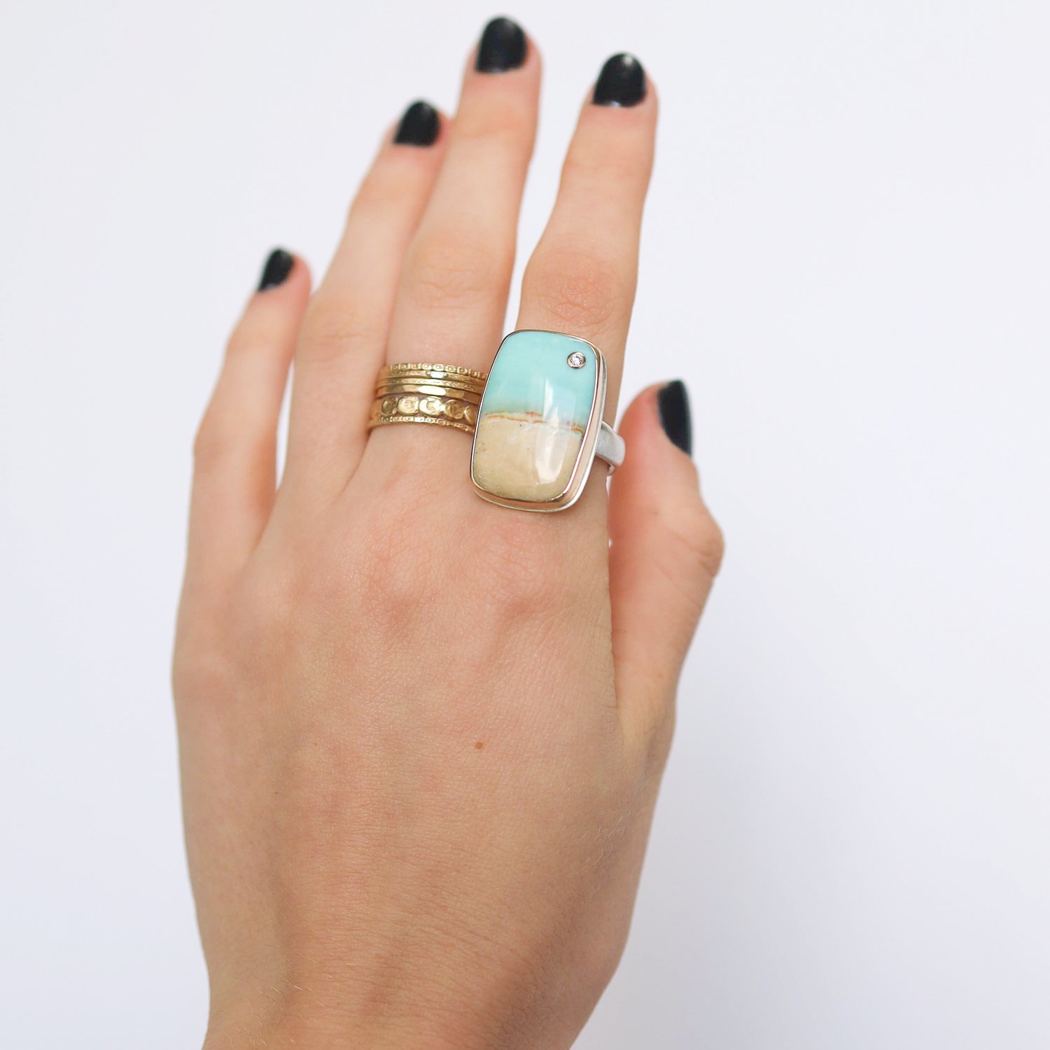 Jamie Joseph: Ring, Vertical rectangular, 14K gold bezel set blue Indonesian petrified opalized wood, Diamond, .03ct, Sterling silver groovy band, Stone measures 1 x 5/8, Currently available in size 7 1/2