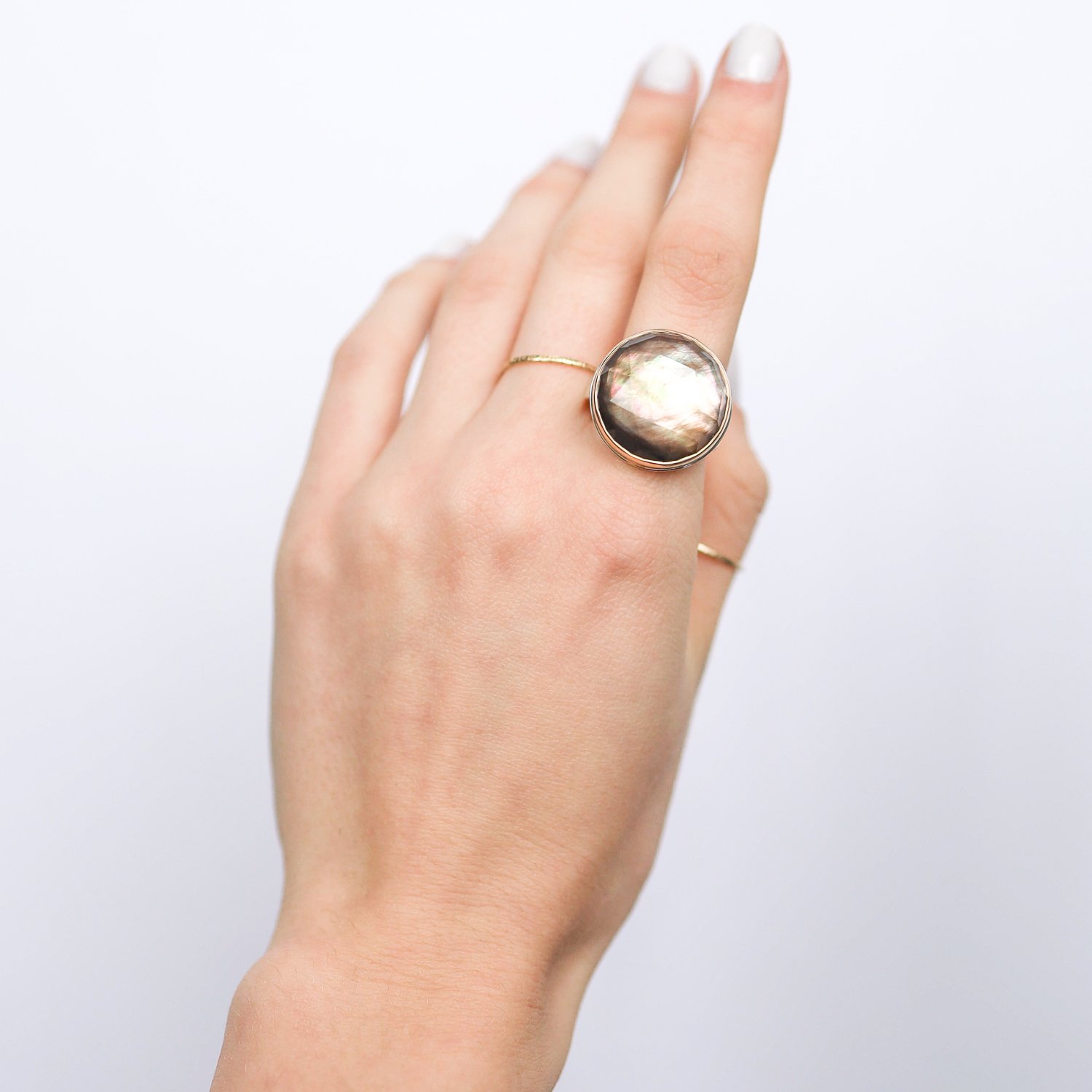 Jamie Joseph: Ring, Round rose cut, 14K gold bezel set rock crystal over black mop, Sterling silver live edge band, Stone measures 3/4 in diameter, Currently available in size 7 1/2