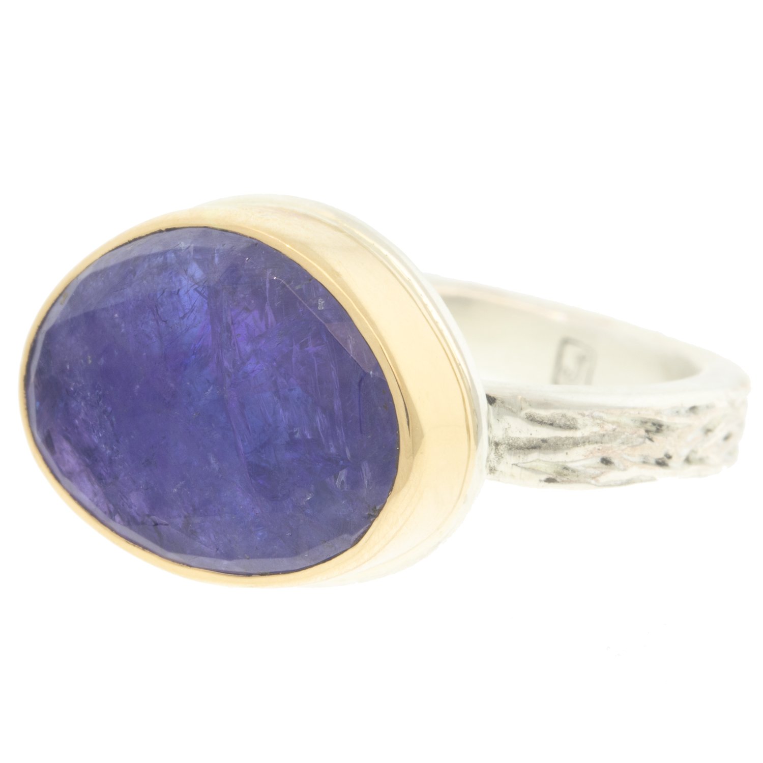 Jamie Joseph: Ring, Small asymmetrical rose cut, 14K yellow gold bezel set tanzanite, Sterling silver medium vine band, Stone measures 7/16 x 9/16, Currently available in size 6 3/4
