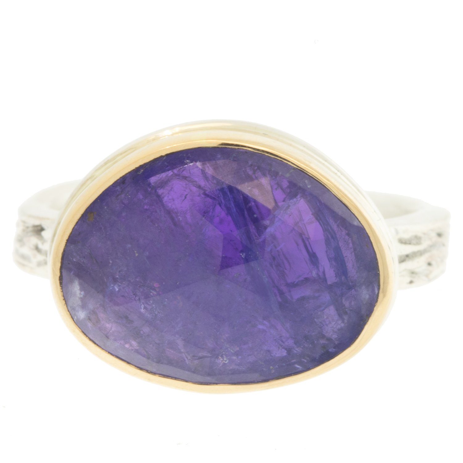 Jamie Joseph: Ring, Small asymmetrical rose cut, 14K yellow gold bezel set tanzanite, Sterling silver medium vine band, Stone measures 7/16 x 9/16, Currently available in size 6 3/4