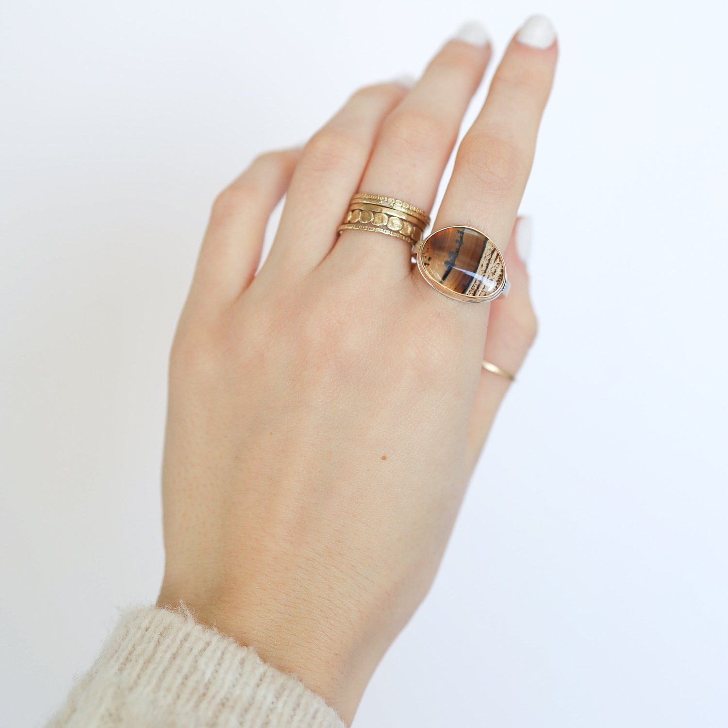 Jamie Joseph: Ring, Asymmetrical, 14K gold bezel set Montana agate, Sterling silver X band, Stone measures 9/16 x 11/16, Currently available in size 7 1/2