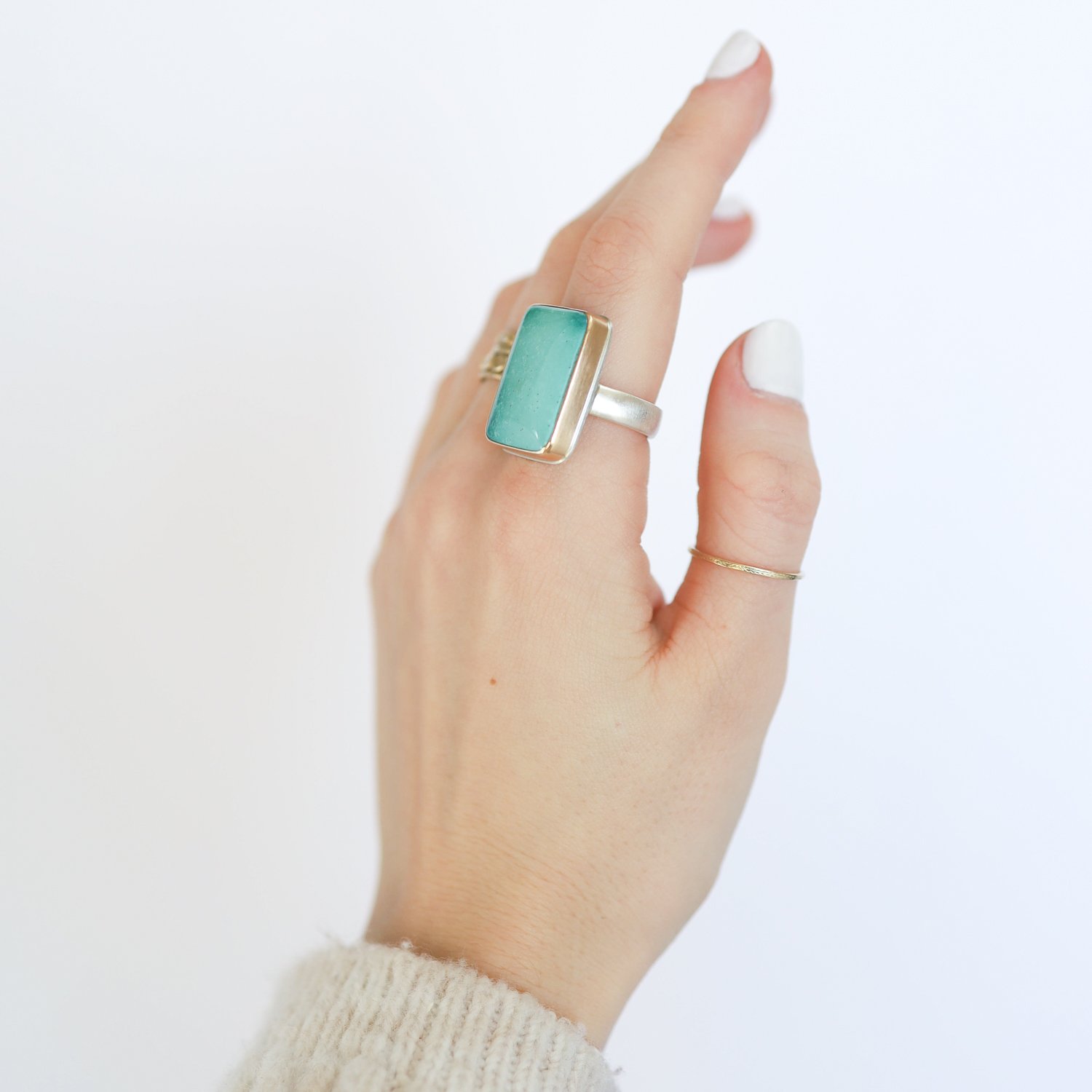 Jamie Joseph: Ring, Sterling & 14K Gold w/ vertical rectangular turquoise on a comfort band size 8