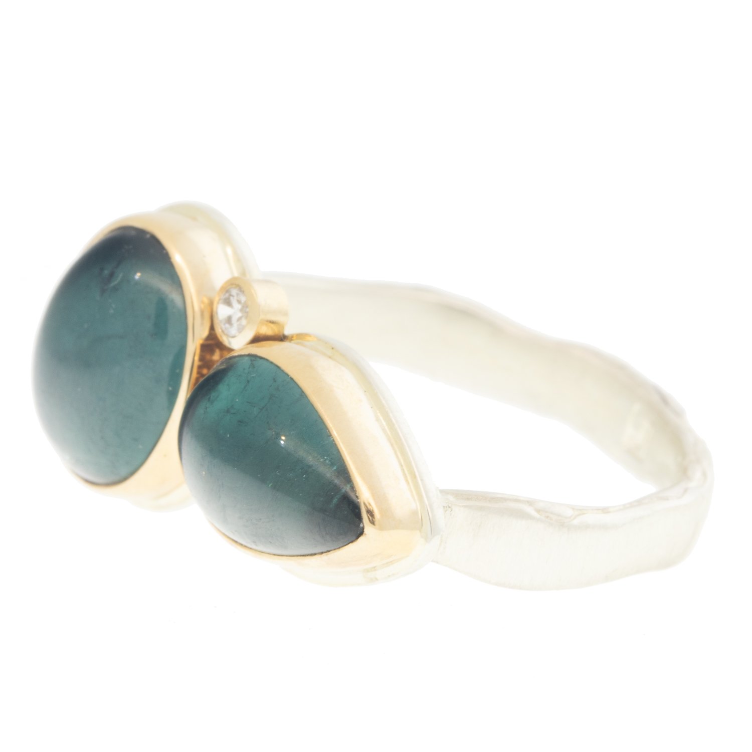 Jamie Joseph: Ring, Double oval and teardrop smooth, 14K gold bezel set indicolite tourmaline, Satellite diamond, .03ct, Sterling silver eroded live edge band, Stone measures 3/8 x 3/4, Currently available in size 7