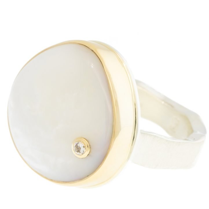 Jamie Joseph: Ring, Smooth asymmetrical, 14K gold bezel set mother of pearl, Diamond, .03ct, Sterling silver live edge band, Stone measures 11/16 x 3/4,  Currently available in size 7 1/2