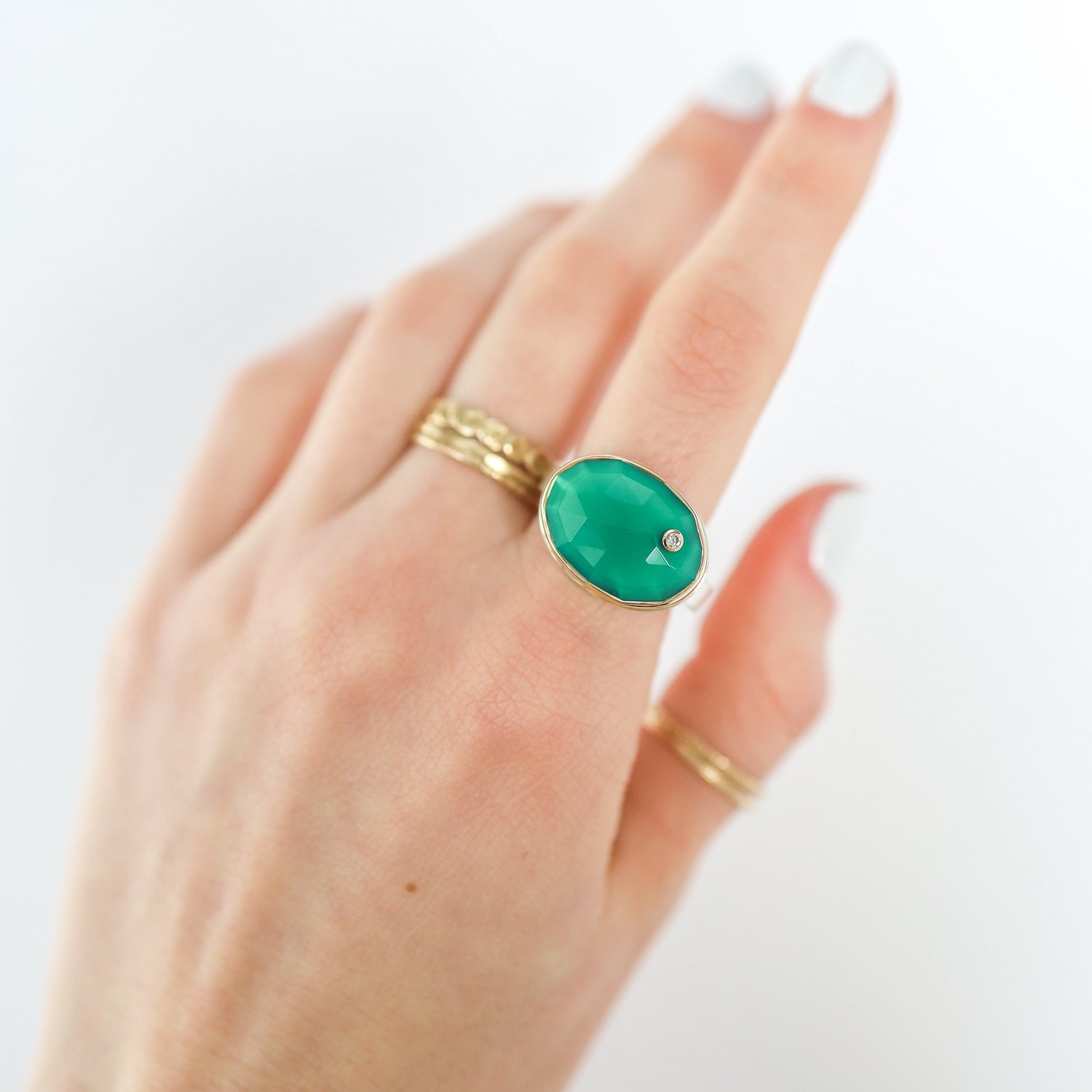 Jamie Joseph: Ring, Oval rose cut, 14K gold bezel set green onyx, Diamond, .03ct, Sterling silver X band, Stone measures 1/2 x 11/16, Currently available in size 7 1/4