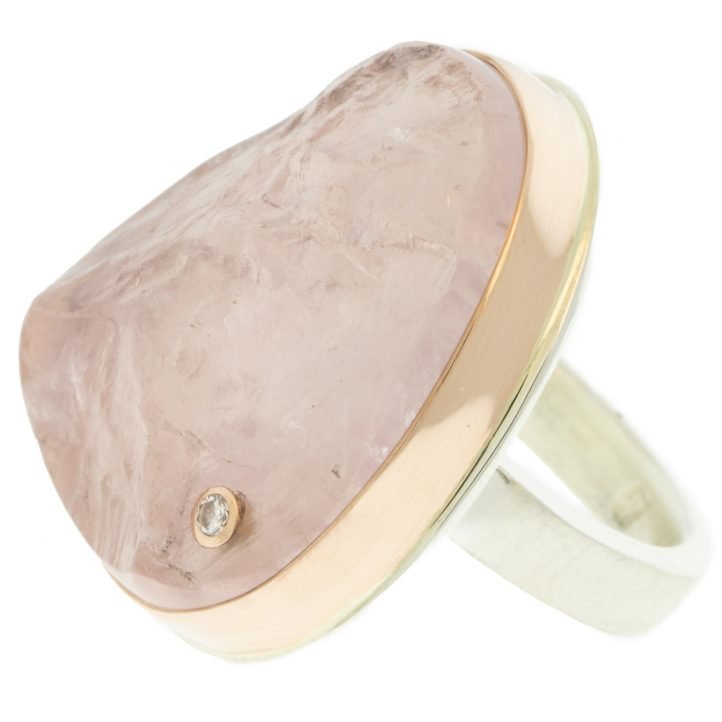 Jamie Joseph: Ring, Large vertical asymmetrical surface cut, 14K rose gold bezel set rose quartz, Diamond, .03ct, Sterling silver Y band, Stone measures 1 1/16 x 7/8, Currently available in size 8