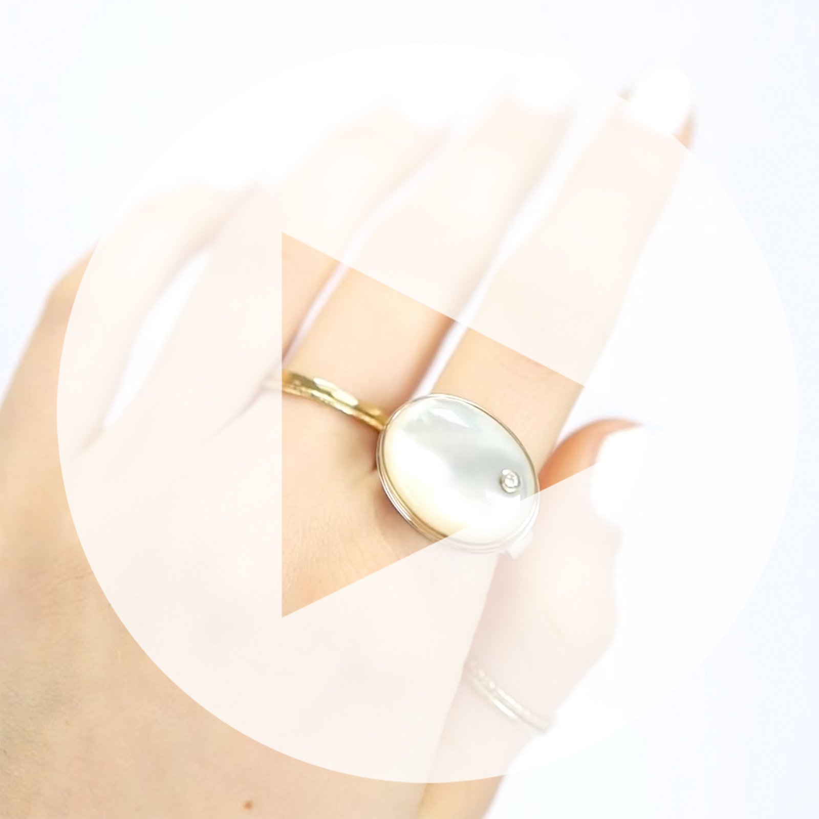Jamie Joseph: Ring, Oval, 14K gold bezel set mother of pearl, Diamond, .03ct, Sterling silver tapered X band, Stone measures 9/16 x 3/4, Currently available in size 7 3/4