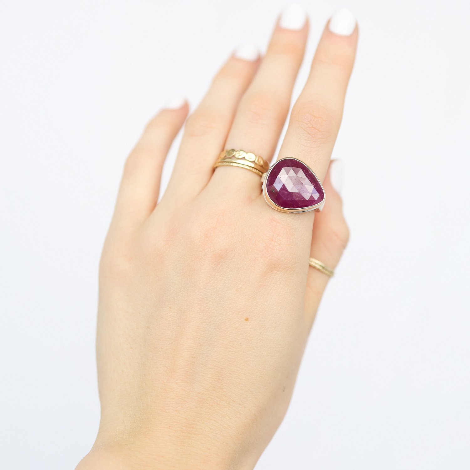 Jamie Joseph: Ring, Teardrop rose cut, 14K gold bezel set Indian ruby, Sterling silver soft live edge band, Stone measures 5/8 x 3/4, Currently available in size 7 1/2