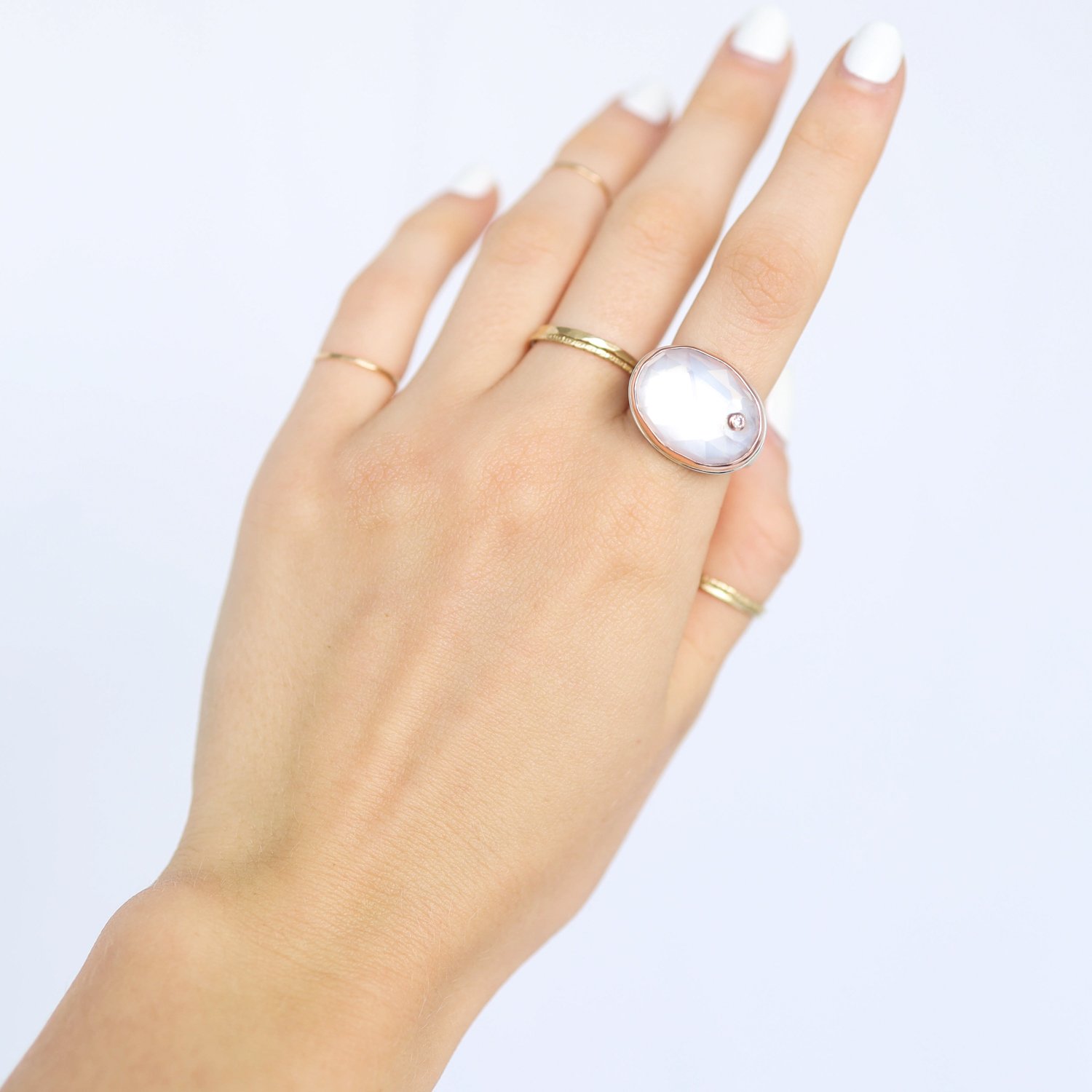 Jamie Joseph: Ring, Oval rose cut, 14K rose gold bezel set Quartz, Diamond, .03ct, Sterling silver Y band, Stone measures 9/16 x 3/4, Currently available in size 7 1/2