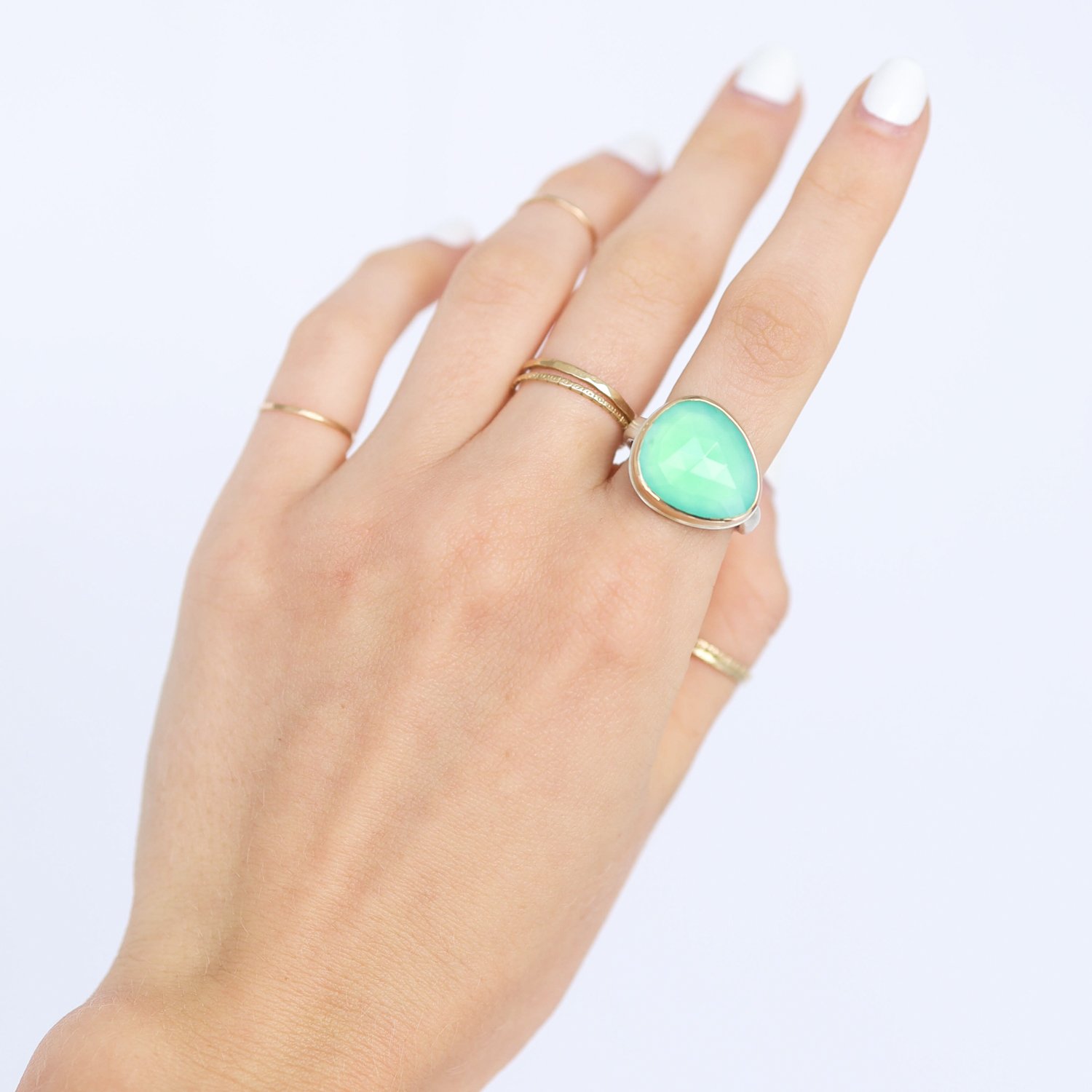 Jamie Joseph: Ring, Small asymmetrical rose cut, 14K gold bezel set chrysoprase, Sterling silver middle groovy band, Stone measures 9/16 x 11/16, Currently available in size 7