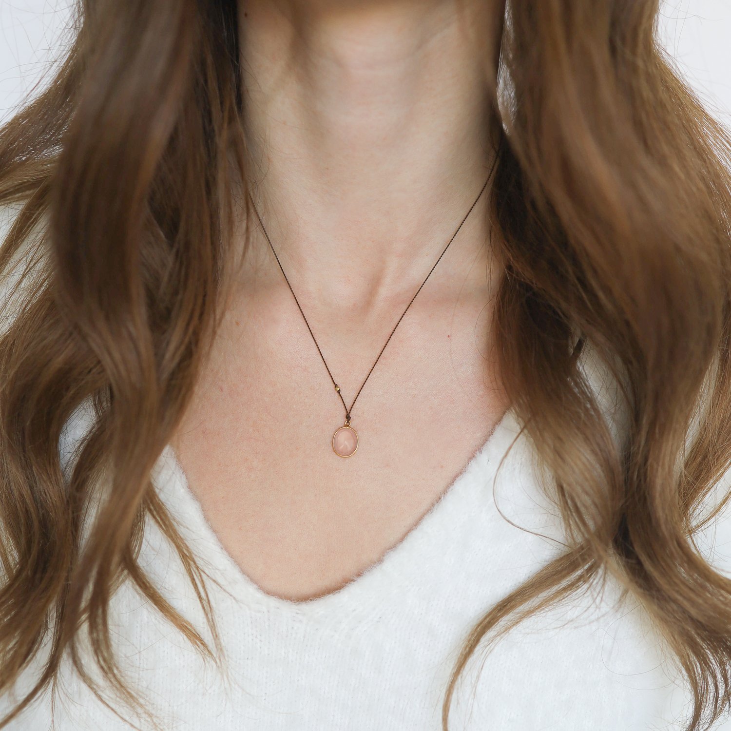 Margaret Solow: Necklace, Rose quartz, 18K yellow gold, Nylon cord measures 17, Pendant measures 9/16 x 7/16 including bail