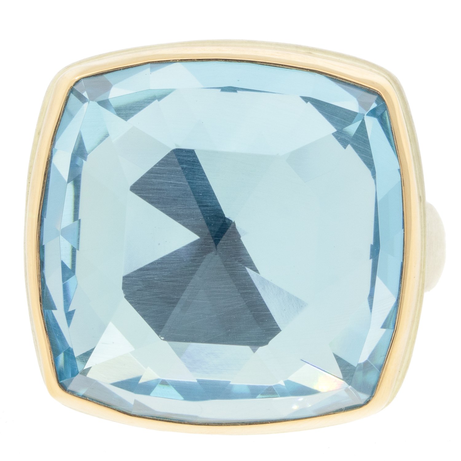 gold and silver ring with blue topaz by jewelry designer Jamie Joseph