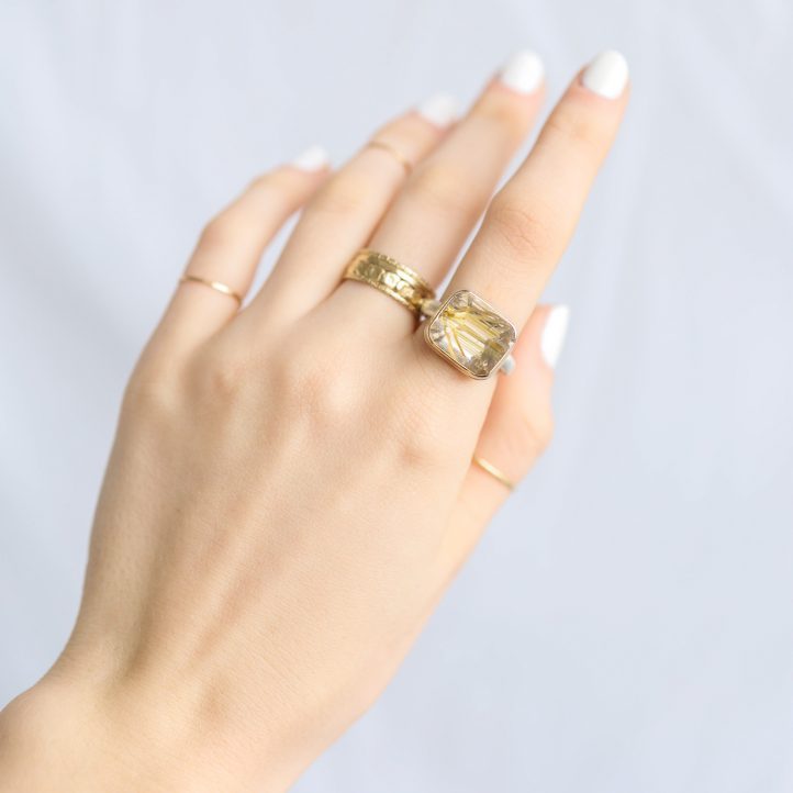 Jamie Joseph: Ring,  SS & 14K gold bezel set Small Rectangular Inverted GOLDEN RUTILATED QUARTZ on Middle Groovy Band sz. 7, 1/2" x 9/16"