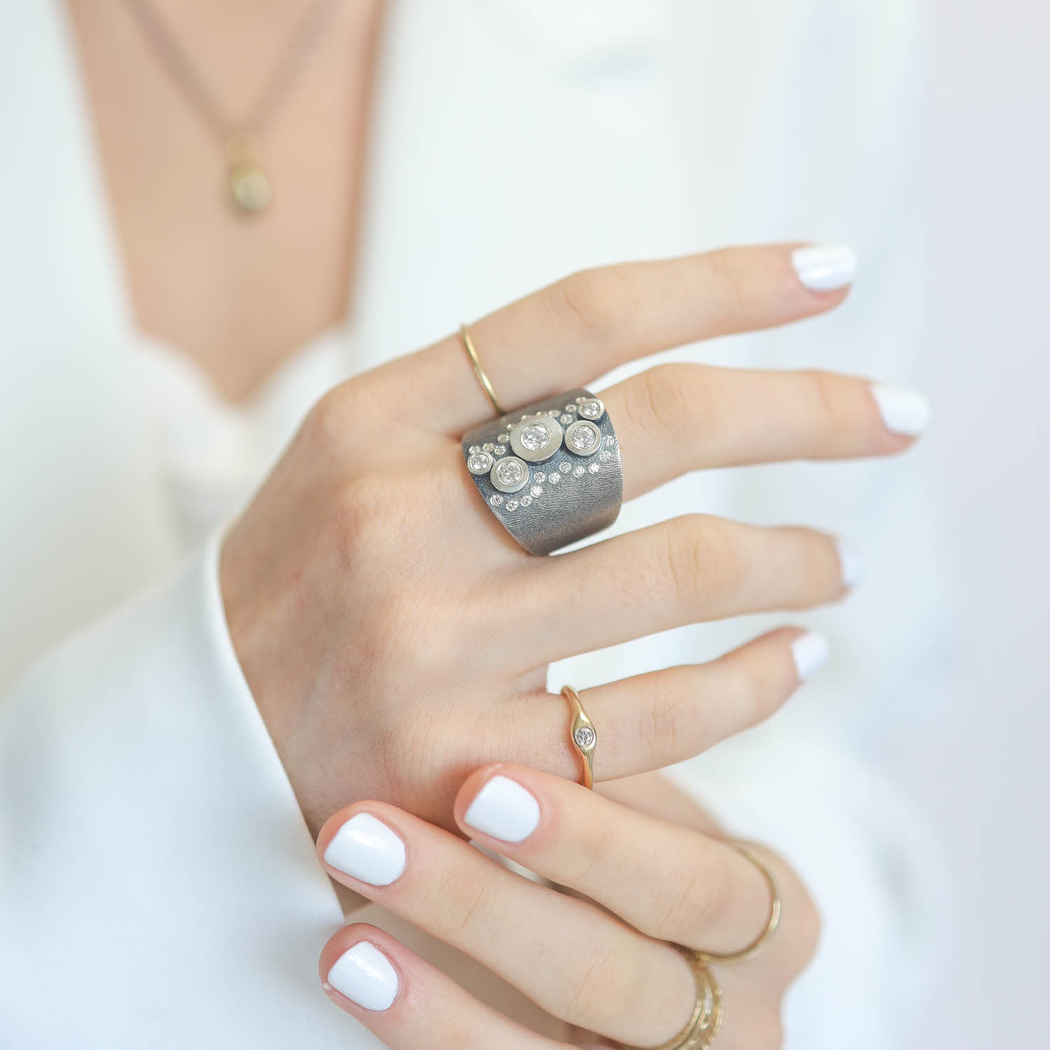 Rene Escobar Trunk show: Ring,Silver ,0.90ct diamond, STERLING SILVER Bezel size 7 1/4, measures 7/8" at widest point