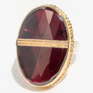 Gold and silver ring with rhodolite garnet by jewelry designer Jamie Joseph