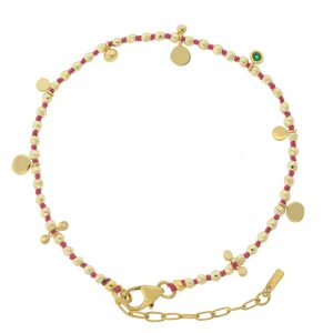 Tai: Gold hematite knotted individually with mini gold disc charm, mini pearls and emerald CZ charm, slide closure bracelet
