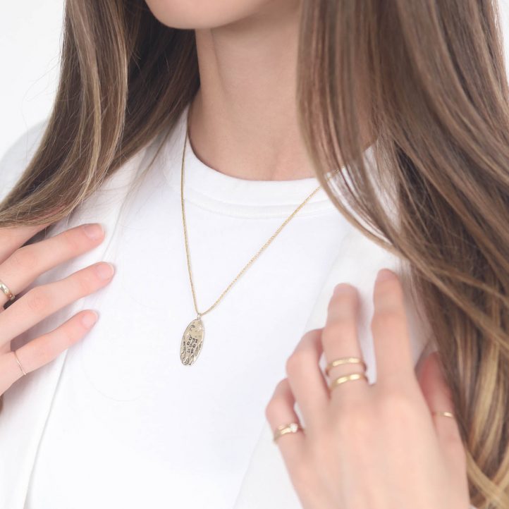 Victoria Cunningham Trunk Show: 14K b present (charm only) 1 1/8 x 1/2