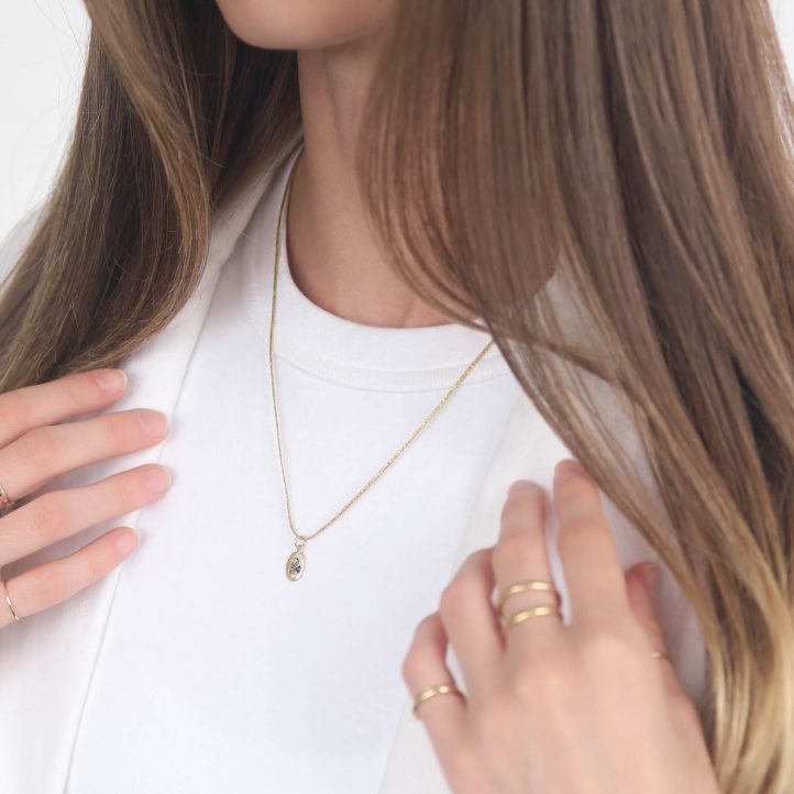 Victoria Cunningham Trunk Show: 14K sacred (charm only)5/8 x 1/4