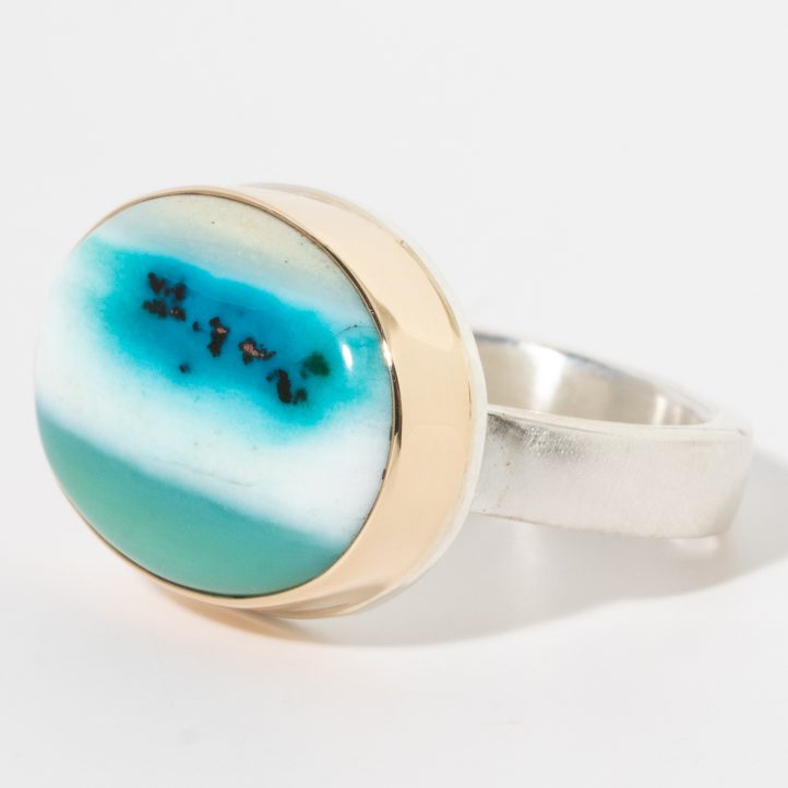 Jamie Joseph: Sterling & 14K gold ring w/Oval Smooth Indonesian Opalized Wood on Y band 9/16" x 3/4" 9