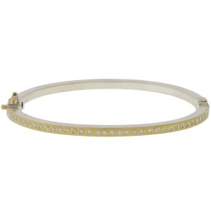 Rene Escobar: Bracelet, Bangle, ADAM, Diamonds all around, .70TCW straight across 18K yg  front and  sterling silver back, 2.5MM