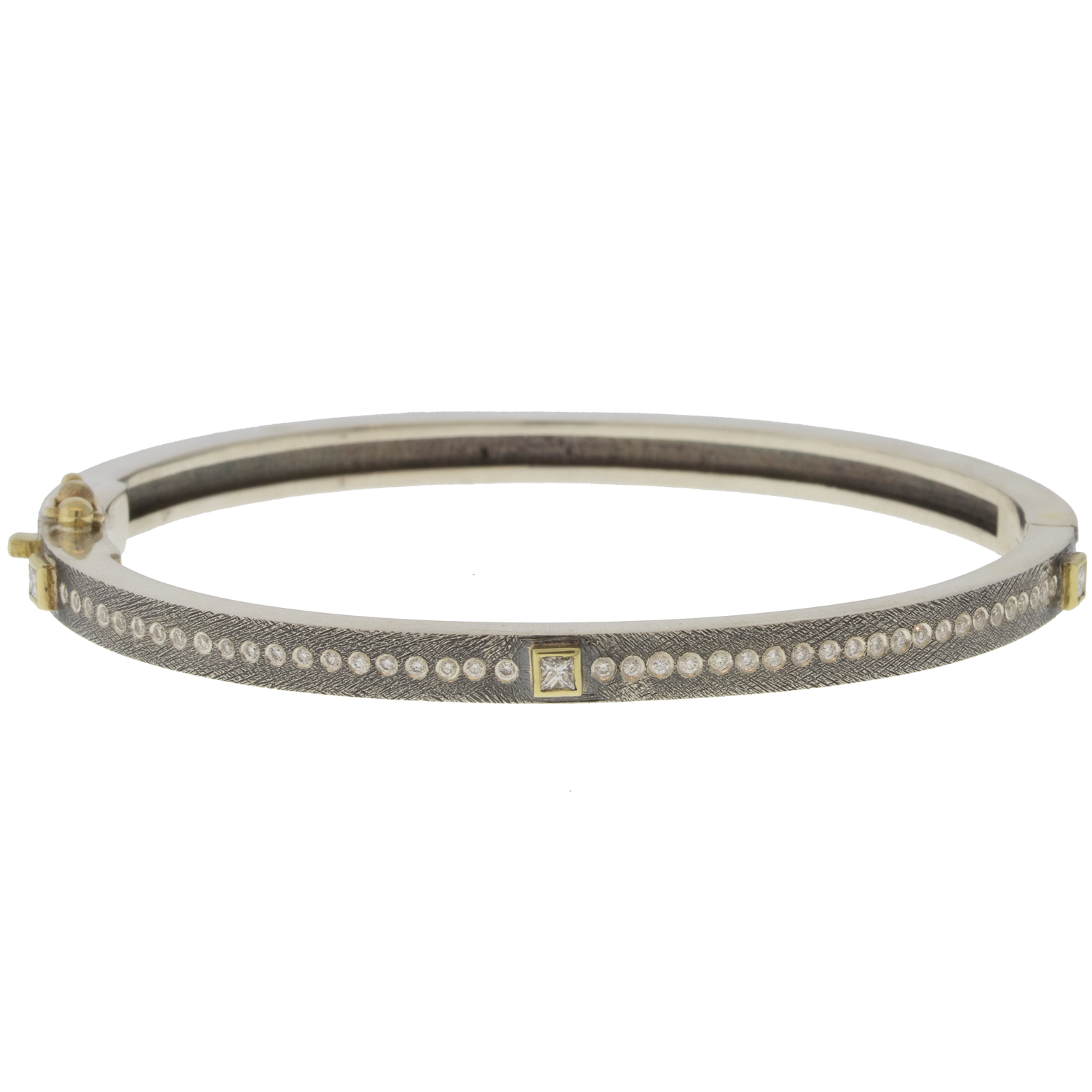 Rene Escobar :PRINCESS 4MM. SS hinged bangle featuring an 18k YG push button style clasp and set with 3 18k YG bezels PRINC cut 0.45CT in WH diamonds.