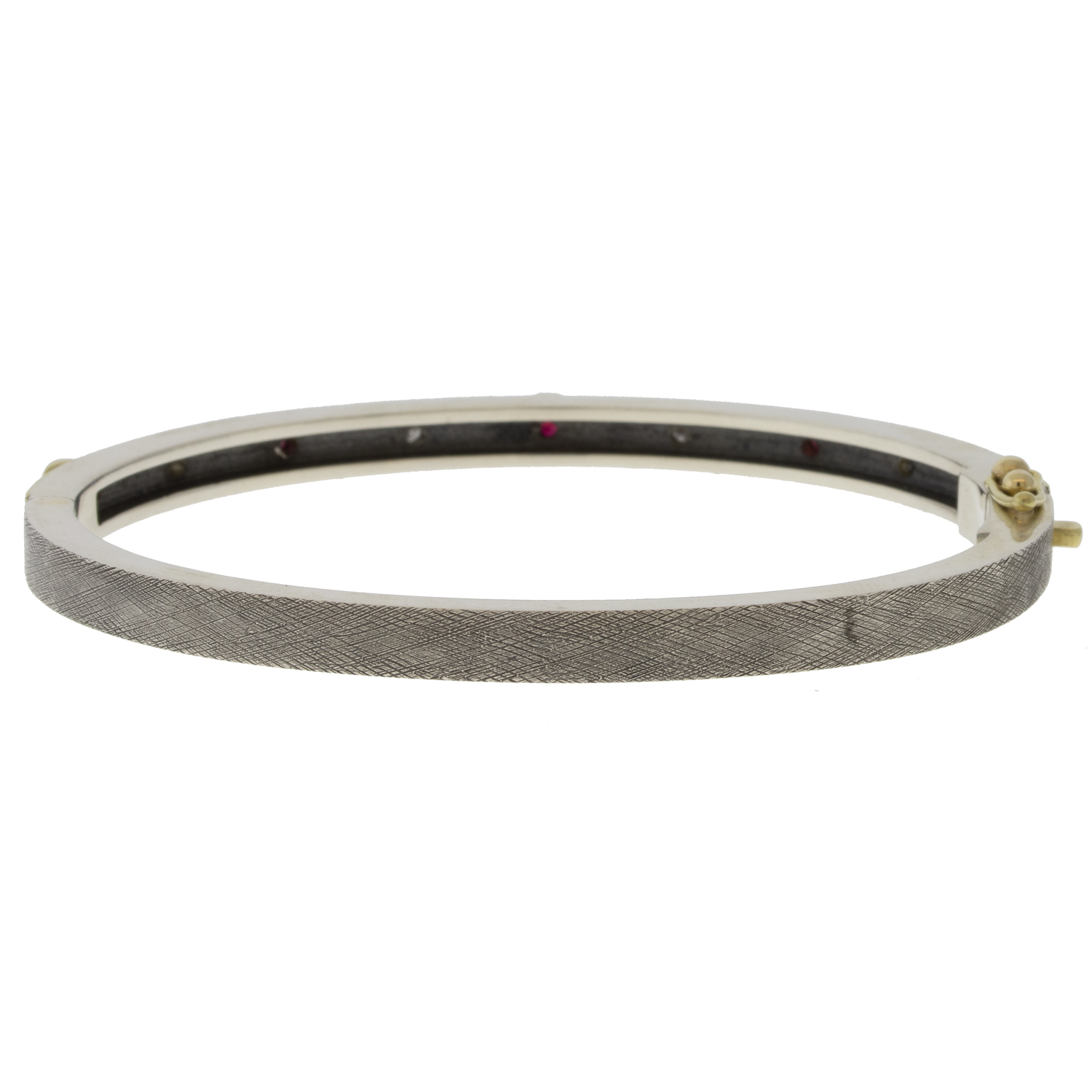 Rene Escobar Trunk Show:33 4MM. SS hinged bangle featuring an 18k YG push button style clasp and 5 18k YG bezels set 0.88CT of RU.