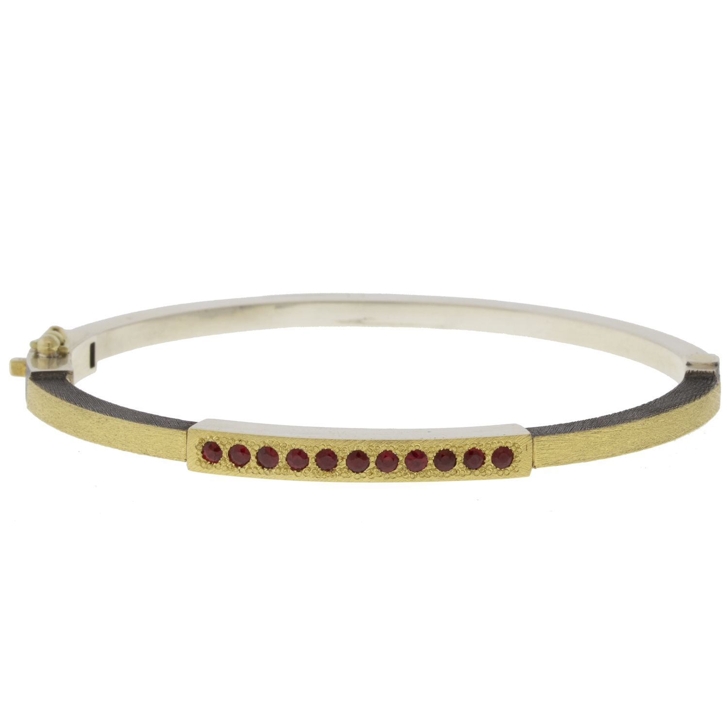 Rene Escobar: 2.5MM. SS hinged bangle featuring an 18k YG push button style clasp and 18k YG top sheet set with 0.40CT RUBY