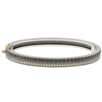 Rene Escobar: 6MM. SS hinged bangle featuring an 18k YG push button style clasp and set with 0.85CT of BK diamonds.