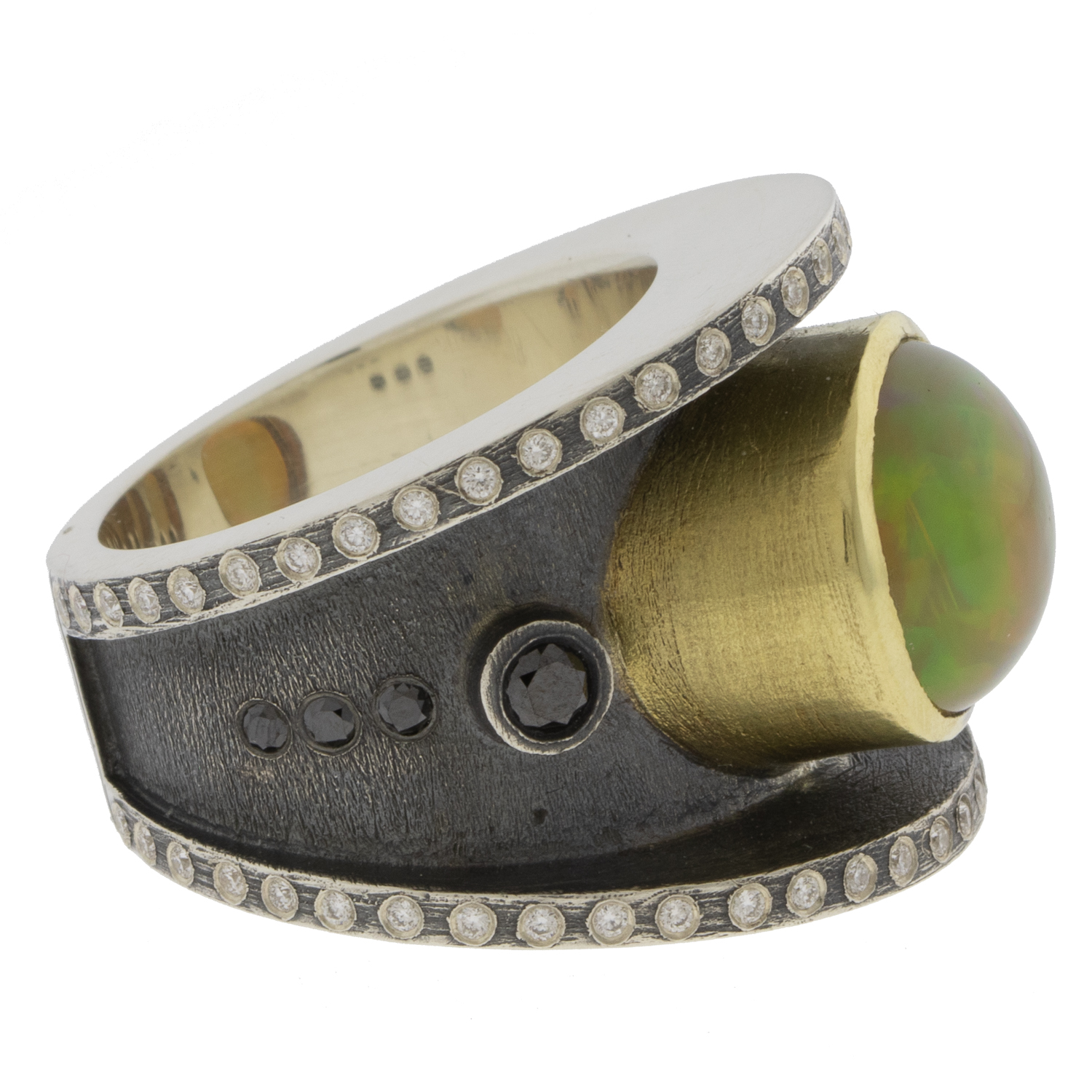 Rene Escobar Trunk Show:SS ring and 18k YG bezel set with 4.08CT in opal and 0.60CT in WH diamonds.