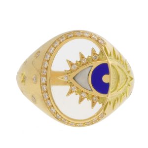 L'atelier Nawbar:Eye on Biladi ring,Handmade 18 ct gold, encrusted with 0.18 ct white diamonds and inlaid with cristal de roche, & lapis stones. Weight 7.88 gr