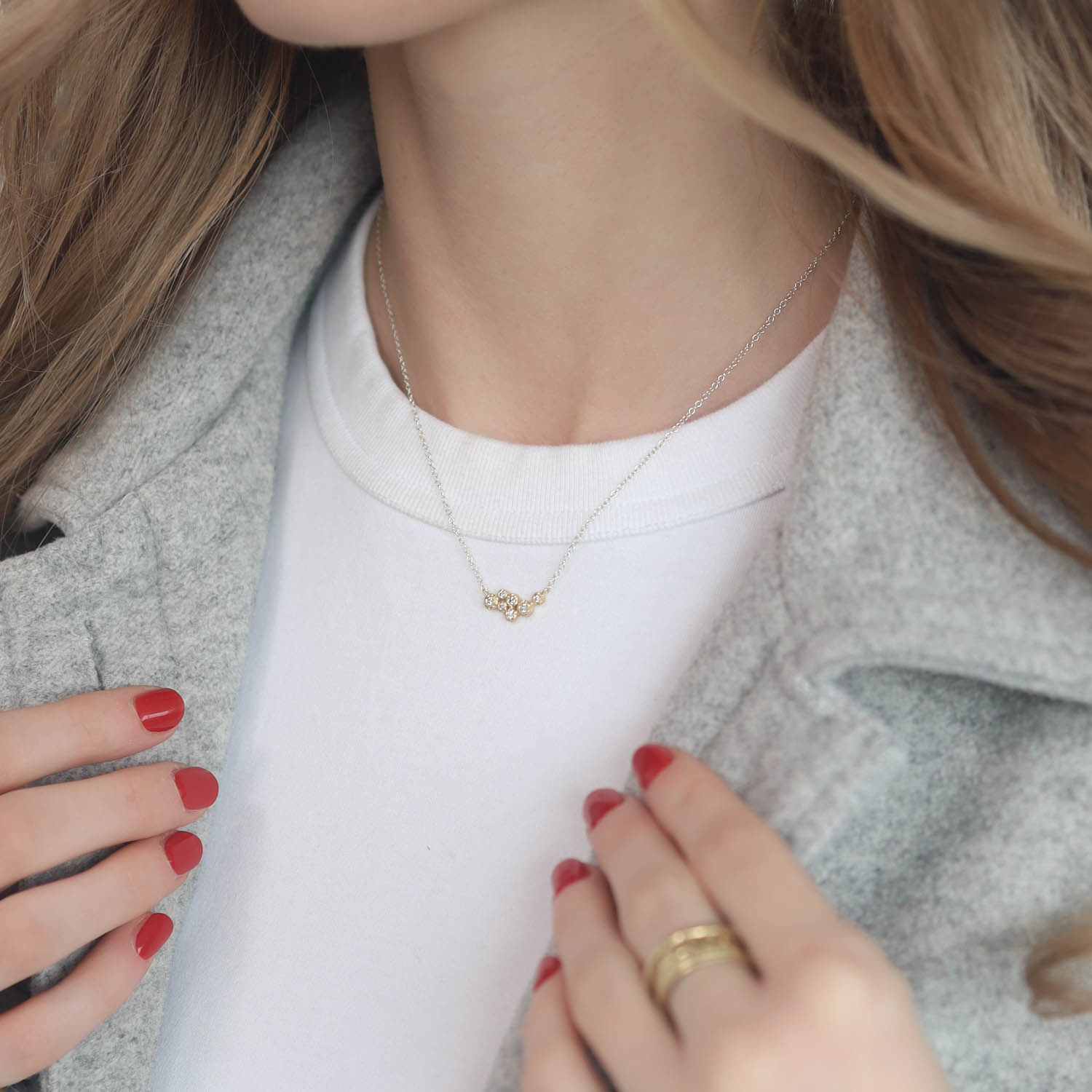 Yasuko Azuma: Necklace, 18ky 7 bezel cluster, 0.18tw dia, 16" SS Chain